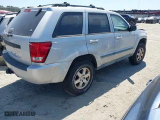 2008 Jeep Grand Cherokee Laredo with VIN 1J8GS48K28C161376, listed as a IAAI auction lot 42048390 with 206,679 mi miles. Bid and sale history available at carsss.com. Image 4.