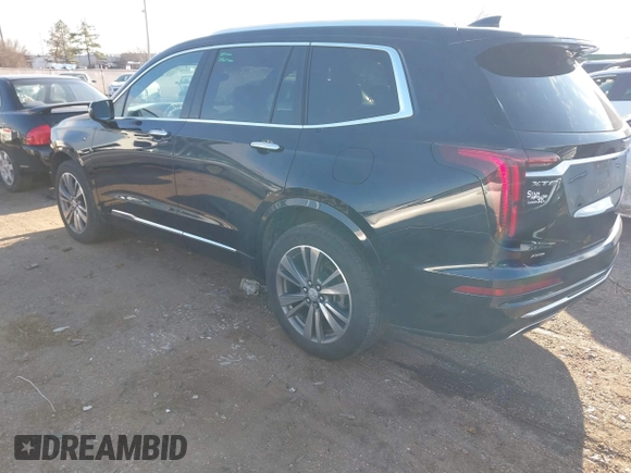 2021 Cadillac XT6 Premium Luxury with VIN 1GYKPFRS9MZ141298, listed as a IAAI auction lot 41304705 with 87,470 mi miles. Bid and sale history available at carsss.com. Image 3.