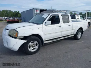 2002 Nissan Frontier 2WD SE with VIN 1N6ED29X02C326644, listed as a IAAI auction lot 40251237 with 291,006 mi miles. Bid and sale history available at carsss.com. Image 2.