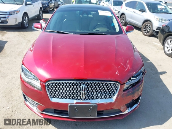 2019 Lincoln MKZ Hybrid Reserve II with VIN 3LN6L5MU7KR617325, listed as a IAAI auction lot 42584481 with 76,118 mi miles and . Bid and sale history available at DreamBid. Image 12.