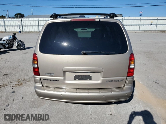 2004 Chevrolet Venture Warner Bros 1SE z VIN 1GNDX13E74D105294, wystawiony jako Copart lot #74743294 z przebiegiem 111 928 mil mil oraz Szkoda całkowita • Salvage title. Historia ofert i sprzedaży dostępna na DreamBid. Obrazek 6.