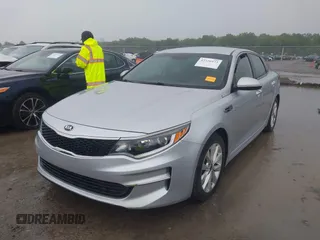 2016 Kia Optima LX z VIN 5XXGT4L37GG010780, wystawiony jako IAAI lot #42320573 z przebiegiem 154 662 mil mil oraz . Historia ofert i sprzedaży dostępna na DreamBid. Obrazek 2.