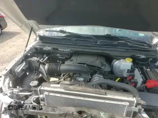 2021 Ram 1500 Rebel z VIN 1C6SRFLT4MN568663, wystawiony jako Copart lot #62730705 z przebiegiem 98 938 mil mil oraz Szkoda całkowita • Salvage title. Historia ofert i sprzedaży dostępna na DreamBid. Obrazek 13.