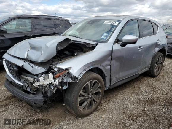 2023 Mazda CX-5 S Premium with VIN JM3KFBDM8P0203834, listed as a Copart auction lot 52496815 with 54,306 mi miles and Non Repairable. Bid and sale history available at DreamBid. Image 1.