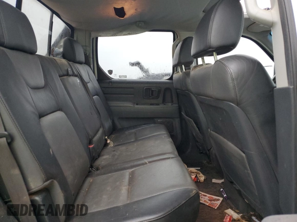 2006 Honda Ridgeline RTL z VIN 2HJYK16546H544183, wystawiony jako Copart lot #57426655 z przebiegiem 162 878 mil mil oraz Szkoda całkowita • Salvage title. Historia ofert i sprzedaży dostępna na DreamBid. Obrazek 10.