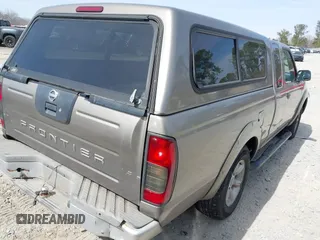 2003 Nissan Frontier XE with VIN 1N6DD26T33C401755, listed as a IAAI auction lot 41759370 with 397,585 mi miles and . Bid and sale history available at DreamBid. Image 4.