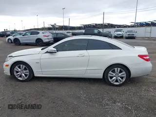 2012 Mercedes-Benz E 350 with VIN WDDKJ5KB9CF164436, listed as a IAAI auction lot 41494355 with 165,147 mi miles and . Bid and sale history available at DreamBid. Image 14.