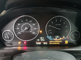 2015 BMW 3 Series 328i xDrive with VIN WBA3B3C50FJ984086, listed as a Copart auction lot 52006475 with 147,065 mi miles and Salvage Title. Bid and sale history available at carsss.com. Image 9.