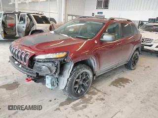 2016 Jeep Cherokee Trailhawk with VIN 1C4PJMBBXGW135138, listed as a IAAI auction lot 41595718 with 267,058 mi miles and . Bid and sale history available at DreamBid. Image 2.