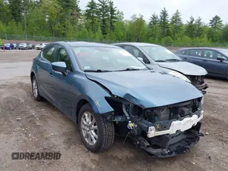 2014 Mazda 3 i Touring z VIN JM1BM1L72E1185133, wystawiony jako IAAI lot #42296879 z przebiegiem 77 185 mil mil oraz . Historia ofert i sprzedaży dostępna na DreamBid. Obrazek 1.