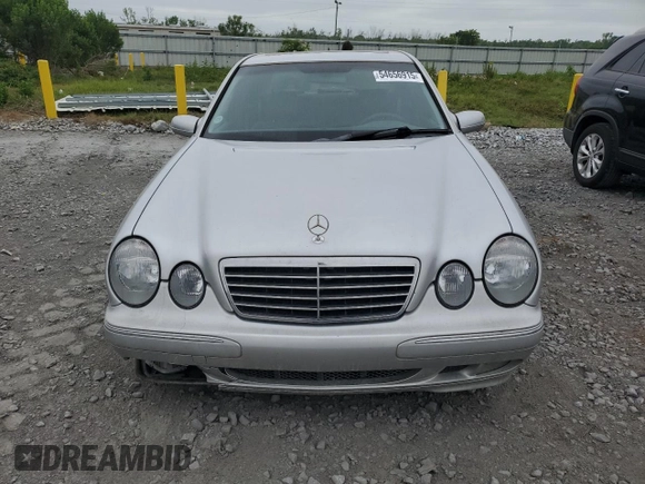 2000 Mercedes-Benz E 320 with VIN WDBJF65J1YB099417, listed as a Copart auction lot 54656915 with 130,387 mi miles and Salvage Title. Bid and sale history available at DreamBid. Image 5.