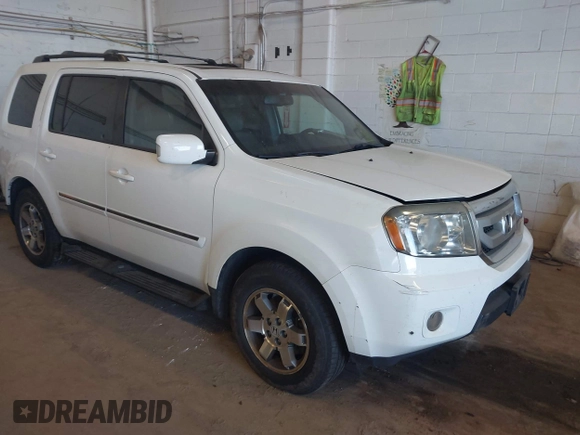 2010 Honda Pilot Touring with VIN 5FNYF4H95AB019903, listed as a IAAI auction lot 42196082 with 233,527 mi miles and . Bid and sale history available at carsss.com. Image 1.