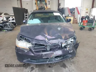 1999 Honda Accord EX z VIN 1HGCG5658XA034945, wystawiony jako IAAI lot #41687146 z przebiegiem 234 497 mil mil oraz . Historia ofert i sprzedaży dostępna na DreamBid. Obrazek 13.