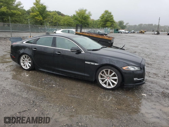 2016 Jaguar XJ R-Sport with VIN SAJWJ1CD7G8V95129, listed as a Copart auction lot 73569464 with 143,740 mi miles and Clean title. Bid and sale history available at DreamBid. Image 4.