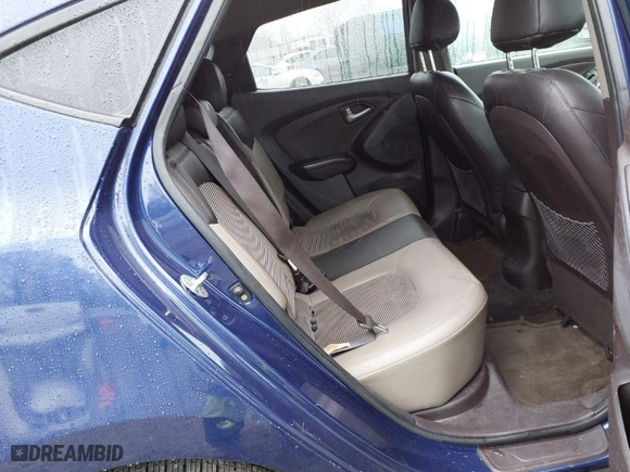 2012 Hyundai Tucson Limited with VIN KM8JU3AC1CU534989, listed as a IAAI auction lot 41513858 with 133,660 mi miles. Bid and sale history available at carsss.com. Image 8.