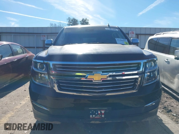 2015 Chevrolet Suburban LTZ with VIN 1GNSCKKC3FR249956, listed as a IAAI auction lot 41306605 with 122,942 mi miles and . Bid and sale history available at DreamBid. Image 12.