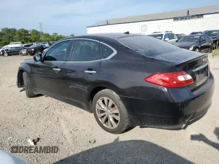 2012 Infiniti M with VIN JN1BY1AR5CM390629, listed as a Copart auction lot 65867354 with 182,780 mi miles and Salvage Title. Bid and sale history available at carsss.com. Image 2.