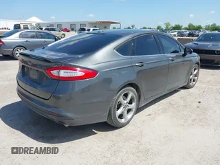 2016 Ford Fusion S z VIN 3FA6P0G78GR239353, wystawiony jako IAAI lot #42078032 z przebiegiem 177 367 mil mil oraz . Historia ofert i sprzedaży dostępna na DreamBid. Obrazek 4.