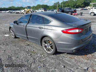 2014 Ford Fusion Titanium with VIN 3FA6P0K98ER197482, listed as a IAAI auction lot 42251293 with 165,520 mi miles and . Bid and sale history available at DreamBid. Image 3.