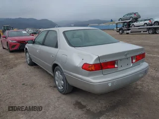 2001 Toyota Camry CE with VIN 4T1BG22K41U832610, listed as a IAAI auction lot 42010506 with 142,175 mi miles. Bid and sale history available at carsss.com. Image 6.