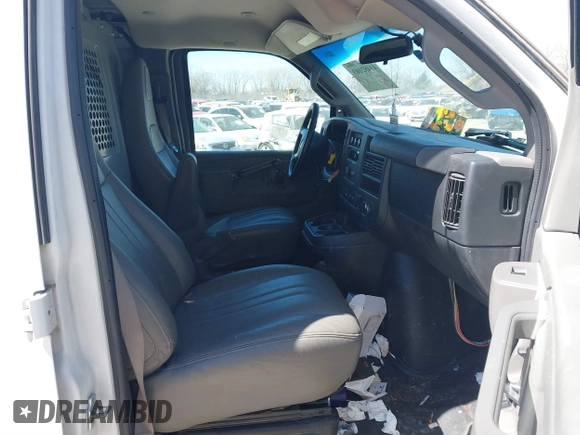 2018 Chevrolet Express Cargo Van with VIN 1GCWGAFP6J1332570, listed as a IAAI auction lot 41482103 with 142,405 mi miles. Bid and sale history available at carsss.com. Image 5.