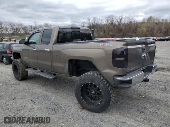 2014 Chevrolet Silverado 1500 LTZ with VIN 1GCVKSEC0EZ140325, listed as a Copart auction lot 52954845 with 128,231 mi miles and Salvage Title. Bid and sale history available at DreamBid. Image 2.