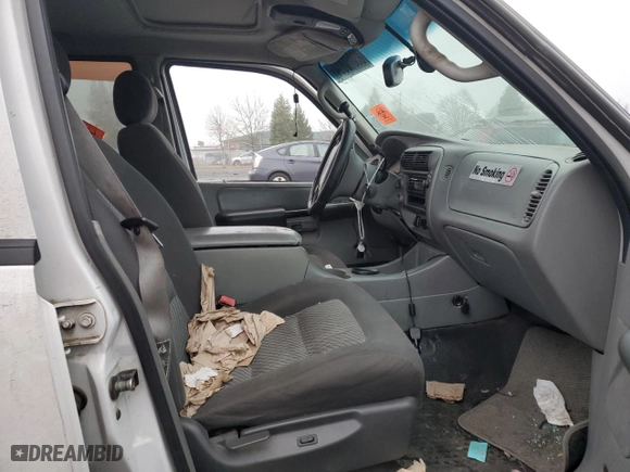 2003 Ford Explorer Sport Trac XLS with VIN 1FMZU77E83UA87385, listed as a Copart auction lot 83860814 with 217,941 mi miles and Salvage Title. Bid and sale history available at carsss.com. Image 7.