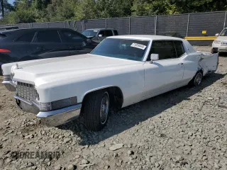 1970 Cadillac DeVille z VIN BMVS2977, wystawiony jako Copart lot #71059444 z przebiegiem 70 693 mil mil oraz Szkoda całkowita • Salvage title. Historia ofert i sprzedaży dostępna na DreamBid. Obrazek 1.