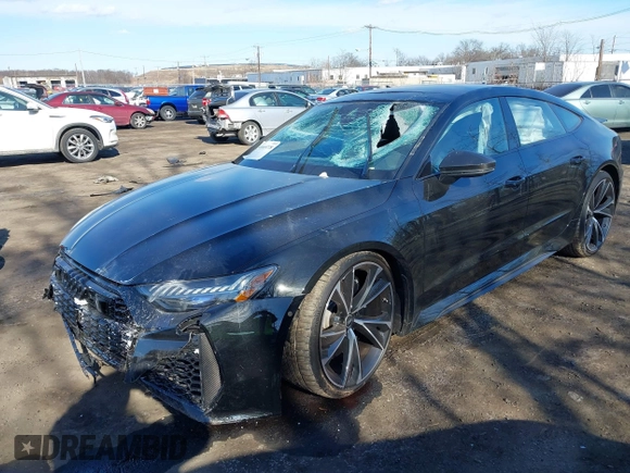 2021 Audi RS 7 z VIN WUAPCBF23MN903930, wystawiony jako IAAI lot #41669778 z przebiegiem 13 175 mil mil oraz . Historia ofert i sprzedaży dostępna na DreamBid. Obrazek 6.