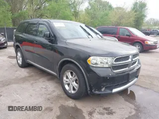2011 Dodge Durango Crew with VIN 1D4RE4GG0BC680070, listed as a IAAI auction lot 42077183 with 223,074 mi miles and . Bid and sale history available at carsss.com. Image 1.