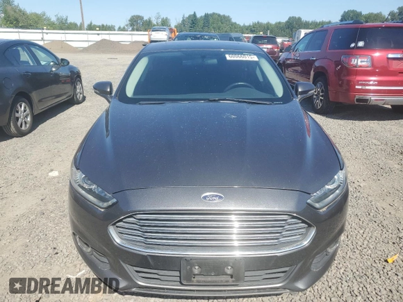 2016 Ford Fusion SE Hybrid z VIN 3FA6P0LU3GR173886, wystawiony jako Copart lot #60066015 z przebiegiem 140 328 mil mil oraz Szkoda całkowita • Salvage title. Historia ofert i sprzedaży dostępna na DreamBid. Obrazek 5.