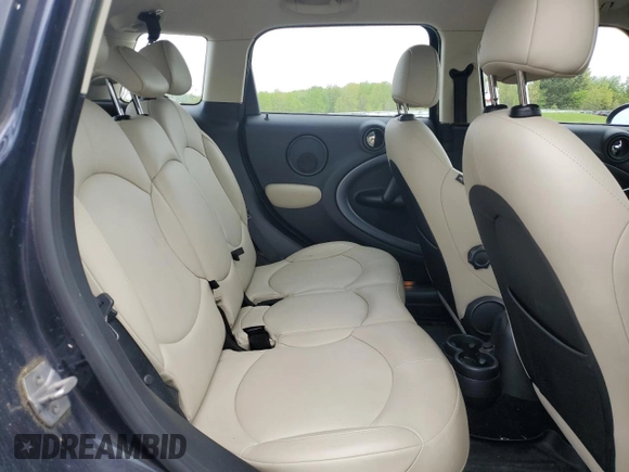 2015 MINI Countryman S with VIN WMWZC5C56FWP47995, listed as a Copart auction lot 55924945 with 46,825 mi miles and Salvage Title. Bid and sale history available at DreamBid. Image 11.