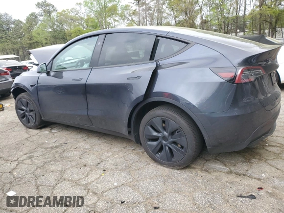2024 Tesla Model Y Long Range z VIN 7SAYGDEE9RA293776, wystawiony jako Copart lot #51289225 z przebiegiem 12 990 mil mil oraz Szkoda całkowita • Salvage title. Historia ofert i sprzedaży dostępna na DreamBid. Obrazek 2.