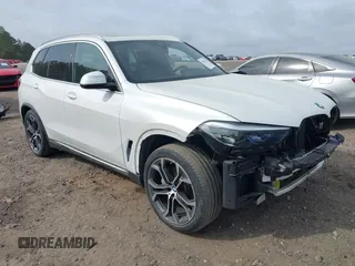 2020 BMW X5 sDrive40i with VIN 5UXCR4C06LLE30688, listed as a IAAI auction lot 41951122 with 39,859 mi miles and . Bid and sale history available at DreamBid. Image 1.