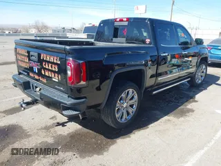 2017 GMC Sierra 1500 Denali with VIN 3GTU2PEJ9HG155420, listed as a IAAI auction lot 41572123 with Not Provided miles and . Bid and sale history available at DreamBid. Image 4.