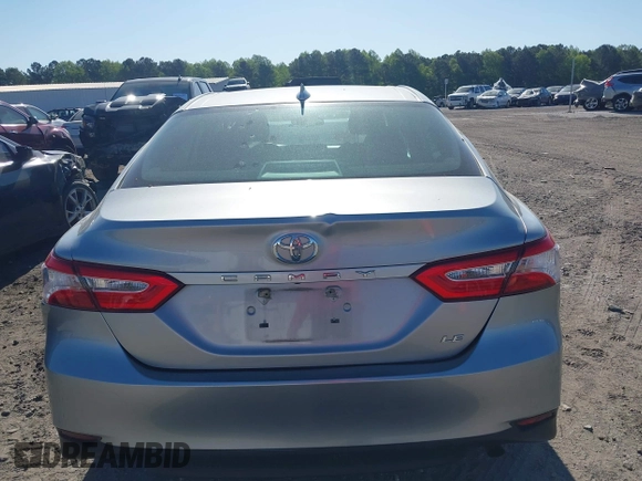2019 Toyota Camry LE z VIN 4T1B11HK7KU756675, wystawiony jako IAAI lot #42063923 z przebiegiem 132 312 mil mil oraz . Historia ofert i sprzedaży dostępna na DreamBid. Obrazek 16.
