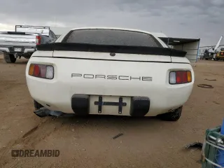 1984 Porsche 928 z VIN WP0JB0921ES860293, wystawiony jako Copart lot #70132694 z przebiegiem 134 907 mil mil oraz Tytuł czysty. Historia ofert i sprzedaży dostępna na DreamBid. Obrazek 6.