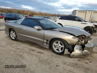 2001 Pontiac Firebird with VIN 2G2FS22K712109736, listed as a Copart auction lot 87247004 with 84,965 mi miles and Clean Title. Bid and sale history available at carsss.com. Image 4.