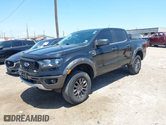 2021 Ford Ranger XL with VIN 1FTER4FH1MLD87968, listed as a IAAI auction lot 42023612 with 64,565 mi miles. Bid and sale history available at carsss.com. Image 2.