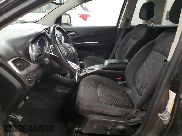 2015 Dodge Journey SXT with VIN 3C4PDCCG9FT722284, listed as a Copart auction lot 84937724 with 210,747 mi miles and Salvage title. Bid and sale history available at DreamBid. Image 7.