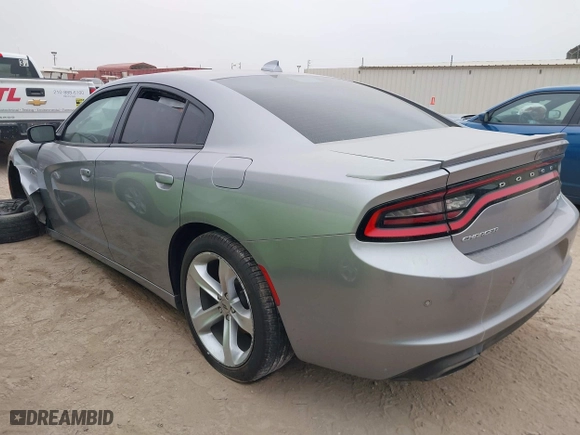 2018 Dodge Charger R/T with VIN 2C3CDXCTXJH148030, listed as a IAAI auction lot 41225873 with 105,069 mi miles. Bid and sale history available at carsss.com. Image 3.