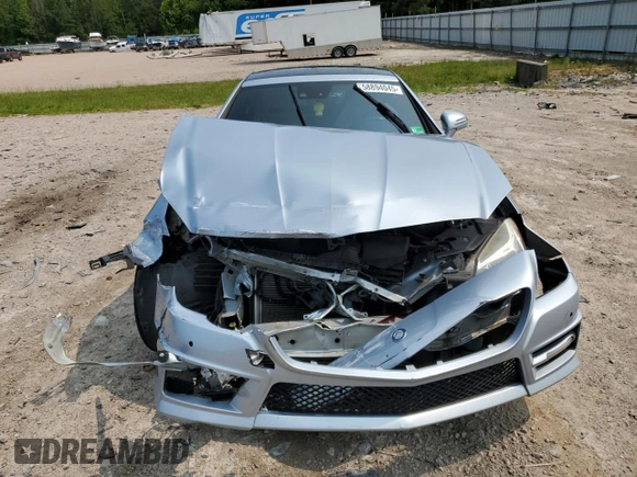 2014 Mercedes-Benz SLK 250 with VIN WDDPK4HA6EF077432, listed as a Copart auction lot 58894045 with 112,551 mi miles and Salvage title. Bid and sale history available at DreamBid. Image 5.