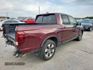 2019 Honda Ridgeline RTL-T with VIN 5FPYK2F60KB002573, listed as a Copart auction lot 63570755 with 111,388 mi miles and Salvage title. Bid and sale history available at DreamBid. Image 3.