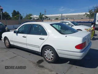 1996 Mercedes-Benz E 320 with VIN WDBJF55F1TJ014659, listed as a IAAI auction lot 42273213 with 151,584 mi miles and . Bid and sale history available at DreamBid. Image 3.
