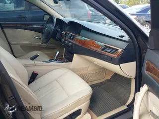 2008 BMW 5 Series 528i with VIN WBANU53558C117336, listed as a IAAI auction lot 42088002 with 127,411 mi miles and . Bid and sale history available at carsss.com. Image 5.