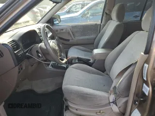 2001 Isuzu Rodeo S with VIN 4S2CK58W314334096, listed as a Copart auction lot 68262924 with 140,657 mi miles and Salvage Title. Bid and sale history available at DreamBid. Image 7.