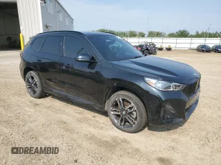 2023 BMW X1 xDrive28i with VIN WBX73EF02P5W55996, listed as a Copart auction lot 61164215 with 23,644 mi miles and Clean title. Bid and sale history available at DreamBid. Image 4.