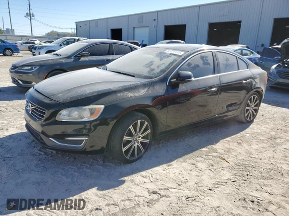 2015 Volvo S60 T5 Drive-E Platinum with VIN YV140MFD6F2301849, listed as a Copart auction lot 82231124 with Not Provided miles and Clean Title. Bid and sale history available at carsss.com. Image 1.