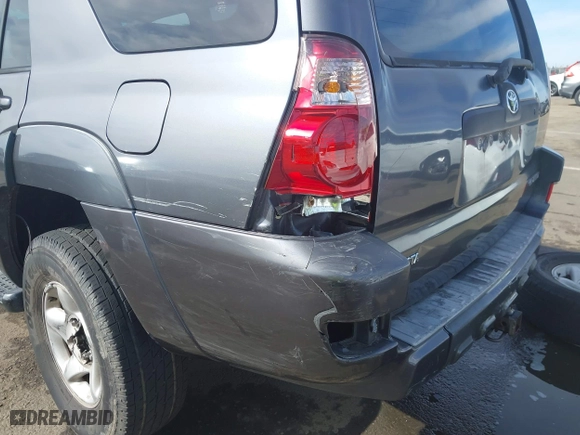 2005 Toyota 4Runner SR5 with VIN JTEZU14R958028894, listed as a IAAI auction lot 41680999 with 215,110 mi miles. Bid and sale history available at carsss.com. Image 6.