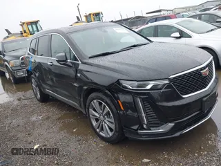 2025 Cadillac XT6 FWD Premium Luxury with VIN 1GYKPCRS3SZ120054, listed as a IAAI auction lot 42166157 with 16,280 mi miles and . Bid and sale history available at DreamBid. Image 1.